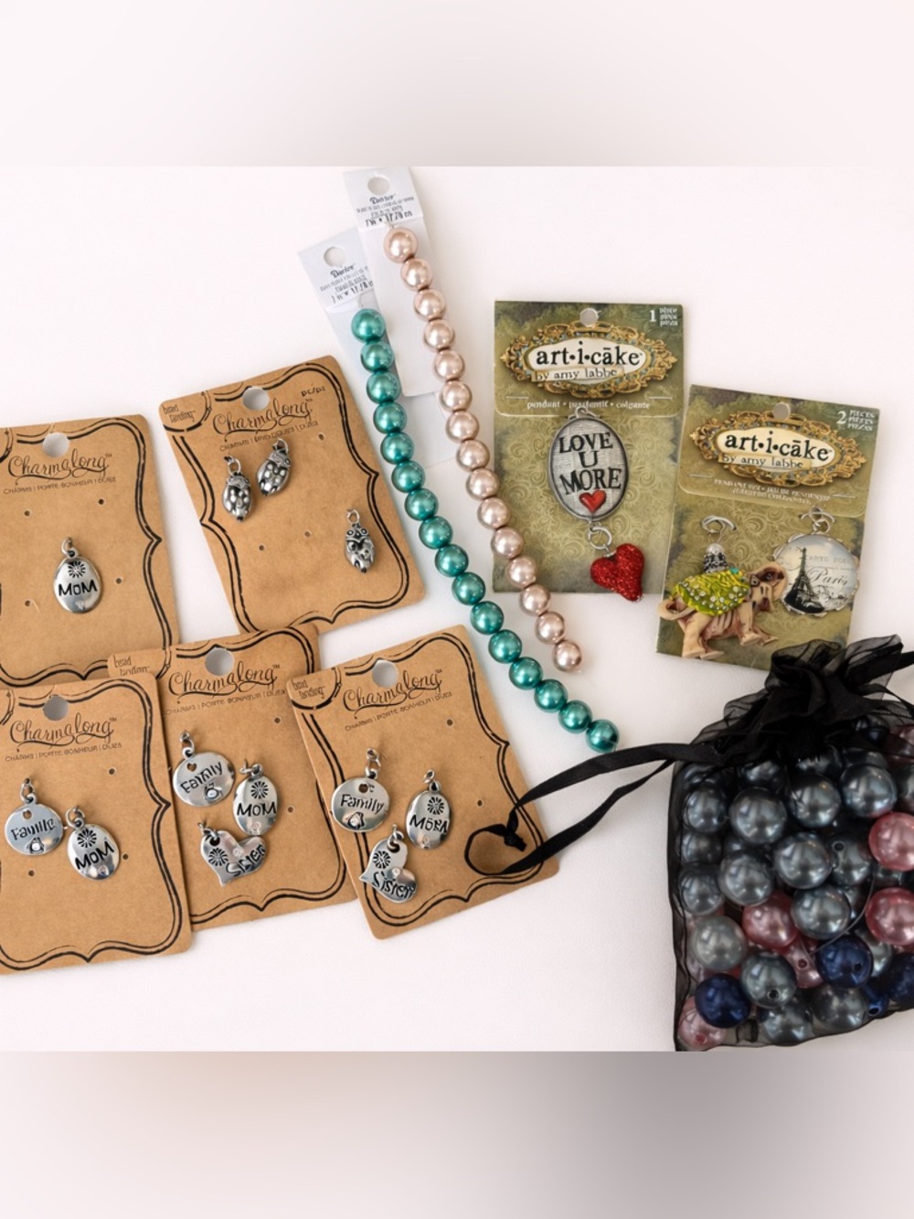 4/$20 Assorted Craft Charms & Glass Beads for bracelet making  (Michaels)